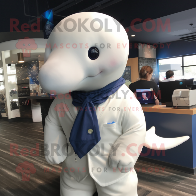 Navy Beluga Whale mascot costume character dressed with a Cardigan and Tie pins Navy Beluga Whale mascot costume character dressed with a Cardigan and Tie pins