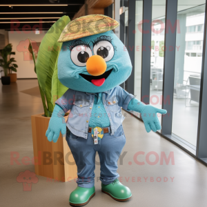 Teal Mango mascot costume character dressed with a Chambray Shirt and Wraps