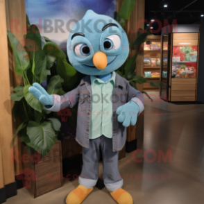 Teal Mango mascot costume character dressed with a Chambray Shirt and Wraps