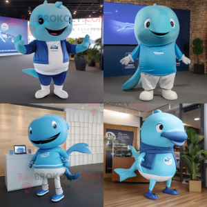 Sky Blue Humpback Whale mascot costume character dressed with a V-Neck Tee and Smartwatches