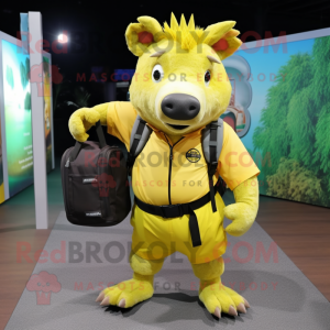 Lemon Yellow Wild Boar mascot costume character dressed with a Bermuda Shorts and Backpacks