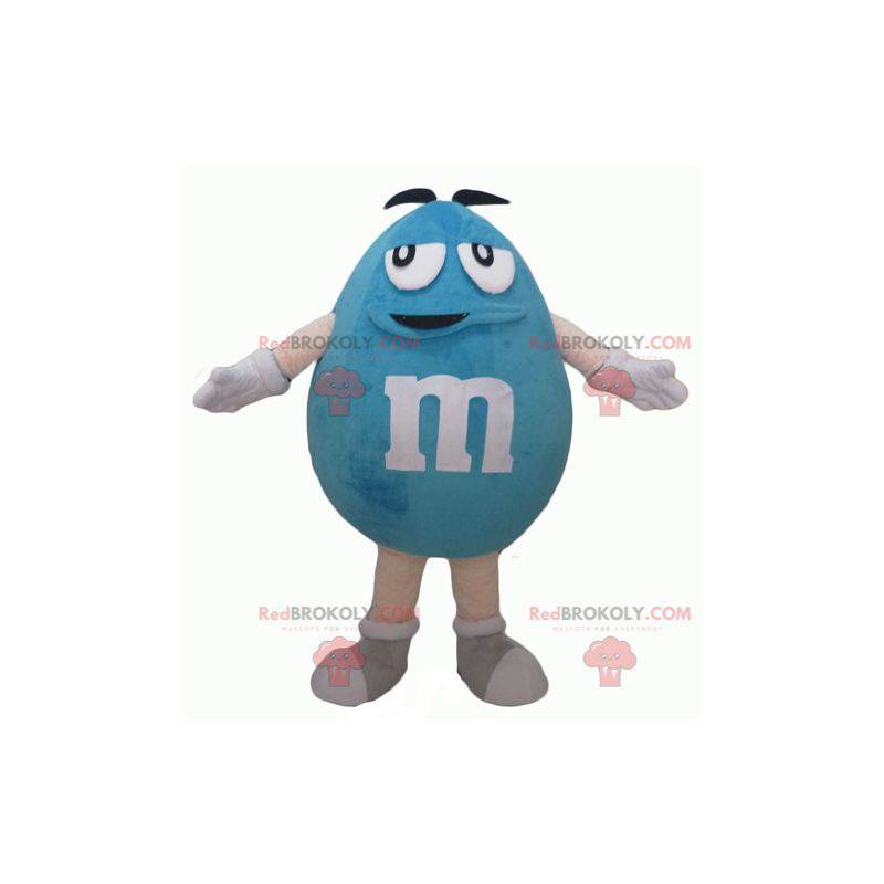 Mascote gigante gordo e engraçado do M&M azul - Redbrokoly.com