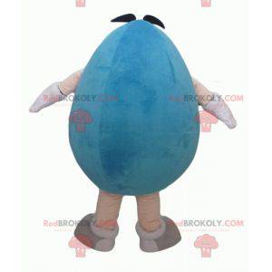 Mollige en grappige gigantische blauwe M & M-mascotte -