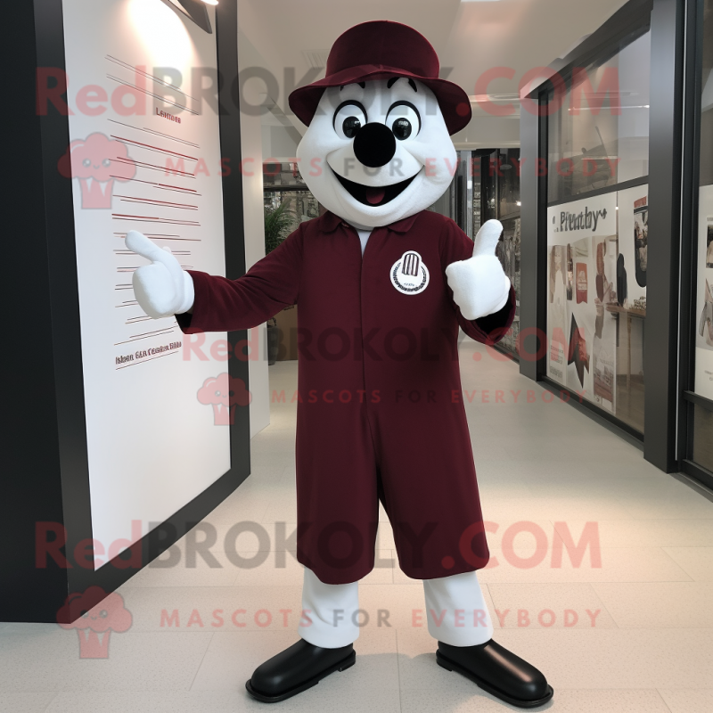 Maroon Mime mascot costume character dressed with a T-Shirt and Tie pins Maroon Mime mascot costume character dressed with a T-Shirt and Tie pins