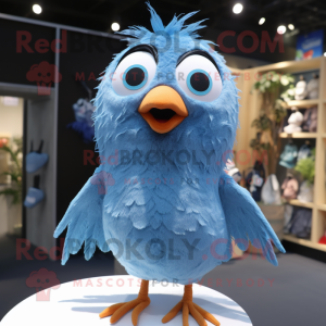 Sky Blue Blackbird mascot costume character dressed with a T-Shirt and Hairpins