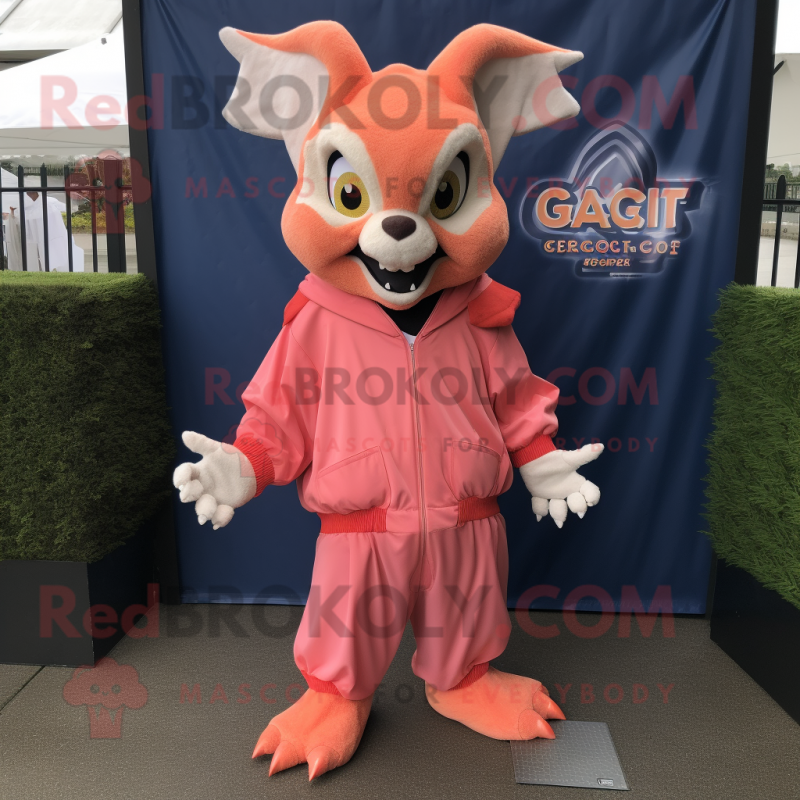 Peach Gargoyle mascot costume character dressed with a Windbreaker and Gloves