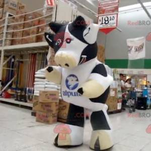 Mascota de vaca gigante en blanco y negro - Redbrokoly.com