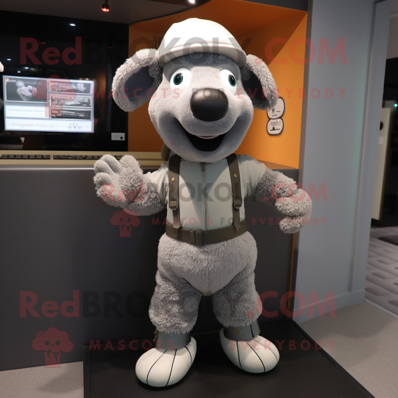 Gray Sheep mascot costume character dressed with a Jumpsuit and Beanies