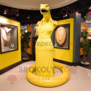 Lemon Yellow Titanoboa mascot costume character dressed with a Sheath Dress and Tie pins