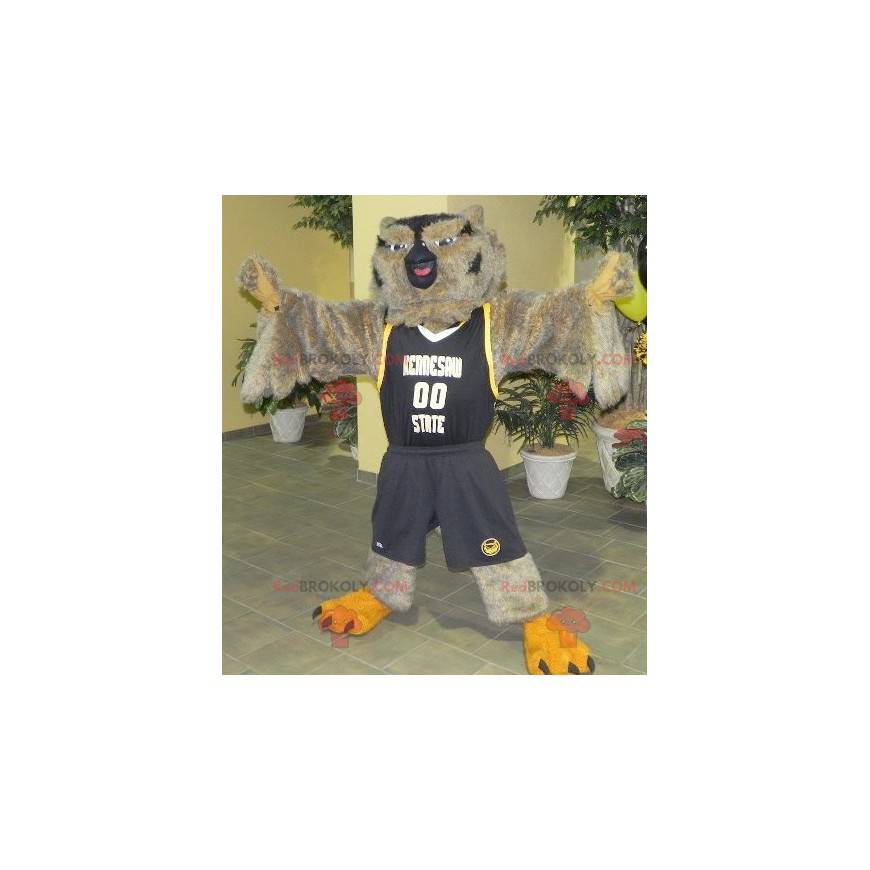 Mascota búho marrón y negro en ropa deportiva - Redbrokoly.com