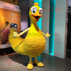 Yellow Peacock mascot costume character dressed with a Tank Top and Anklets