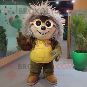 Olive Porcupine mascot costume character dressed with a Overalls and Eyeglasses