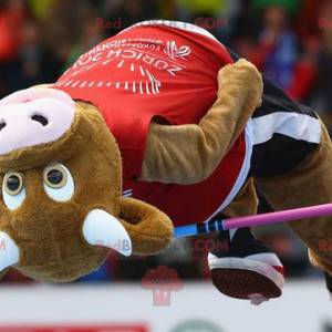 Brun ko maskot i sportstøj - Redbrokoly.com