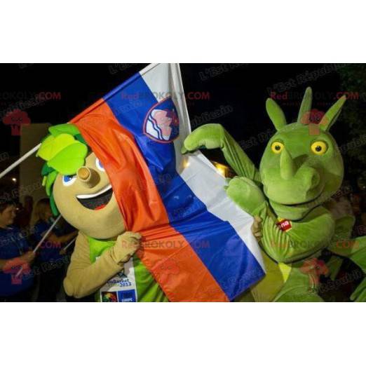 2 mascottes een boom met bladeren en een groene draak -