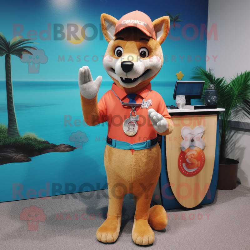 Peach Dingo mascot costume character dressed with a Rash Guard and Tie pins