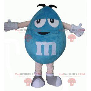 Mascota azul gigante regordeta y divertida de M&M -