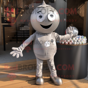 Silver Petanque Ball mascot costume character dressed with a Joggers and Lapel pins