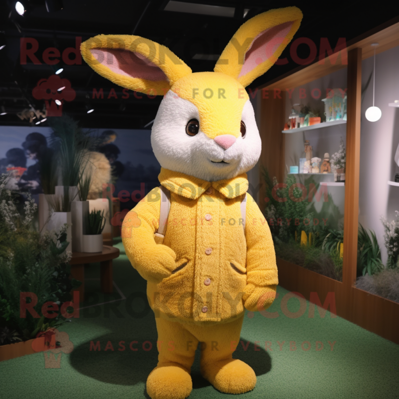 Yellow Rabbit mascot costume character dressed with a Cardigan and Beanies