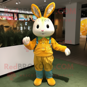 Yellow Rabbit mascot costume character dressed with a Cardigan and Beanies