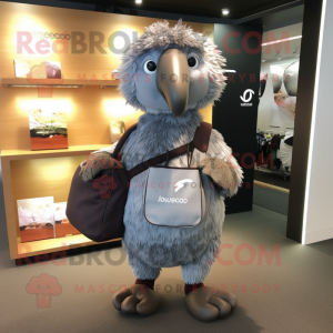 Gray Kiwi mascot costume character dressed with a Wrap Skirt and Messenger bags