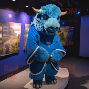 Blue Bison mascot costume character dressed with a Sweatshirt and Shawl pins
