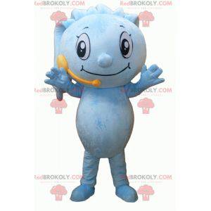 Blue snowman mascot with dreadlocks and a microphone -
