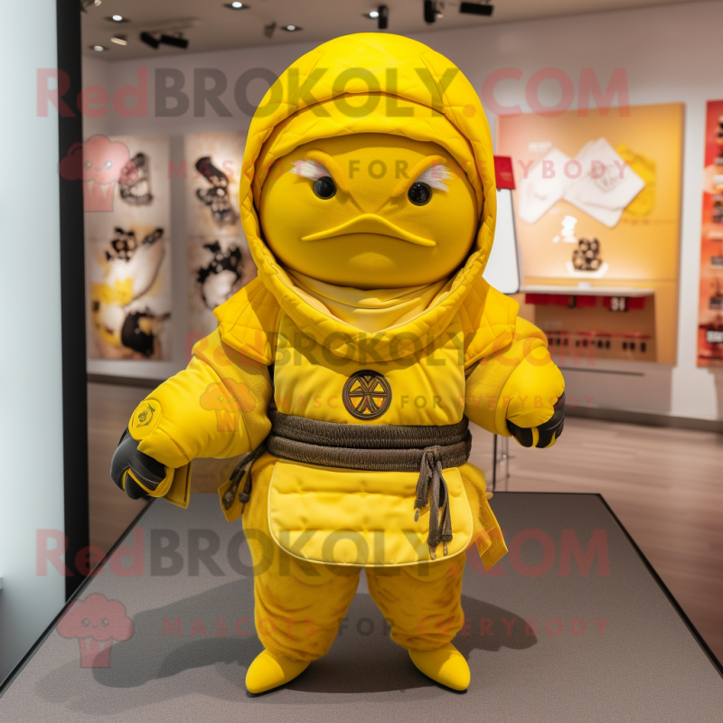 Lemon Yellow Samurai mascot costume character dressed with a Hoodie and Clutch bags Lemon Yellow Samurai mascot costume character dressed with a Hoodie and Clutch bags