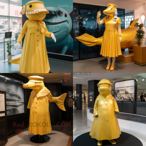 Gold Humpback Whale mascot costume character dressed with a Shift Dress and Berets