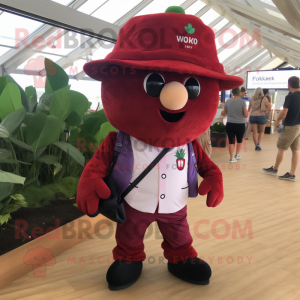 Maroon Strawberry mascot costume character dressed with a Polo Shirt and Belts