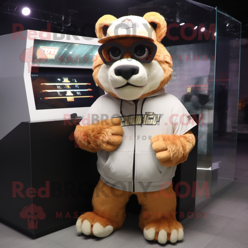 Peach Saber-Toothed Tiger mascot costume character dressed with a Hoodie and Eyeglasses