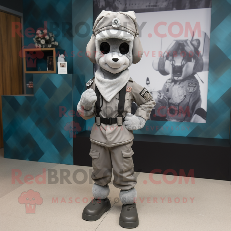 Gray Commando mascot costume character dressed with a Blouse and Pocket squares Gray Commando mascot costume character dressed with a Blouse and Pocket squares