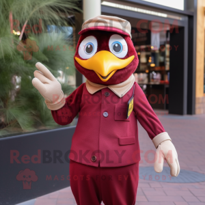 Maroon Canary mascot costume character dressed with a Long Sleeve Tee and Suspenders