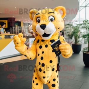 Yellow Cheetah mascot costume character dressed with a V-Neck Tee and Clutch bags