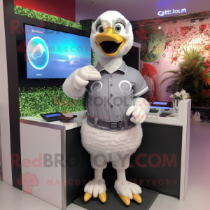 Gray Swans mascot costume character dressed with a Polo Tee and Digital watches