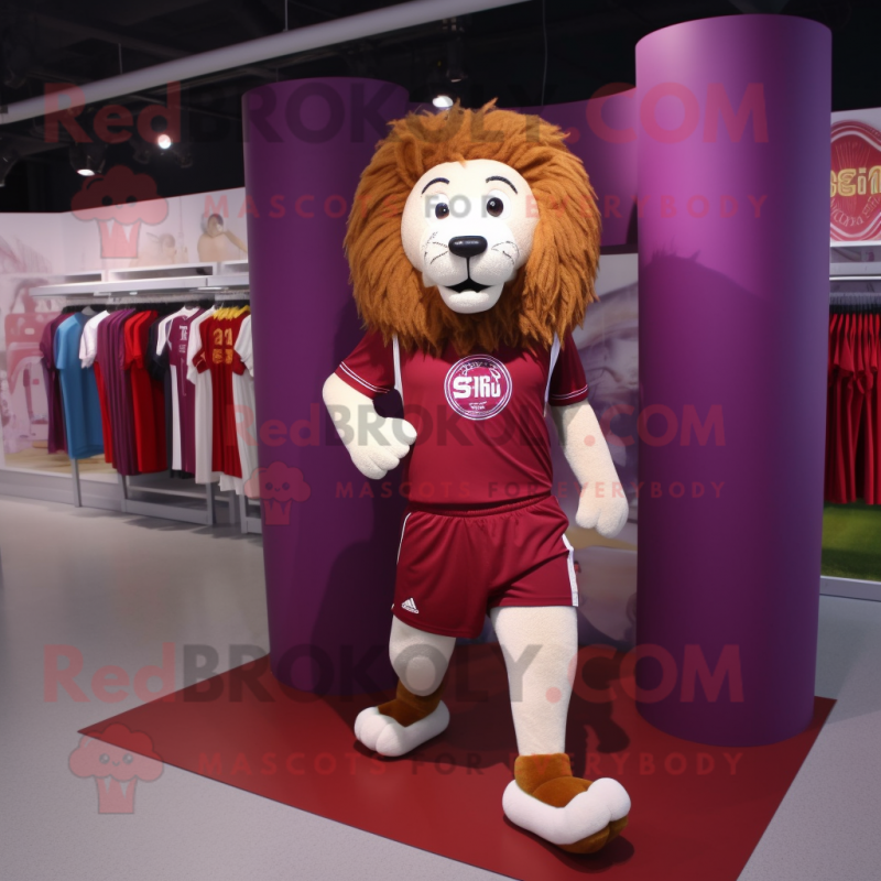 Maroon Lion mascot costume character dressed with a Running Shorts and Shawl pins Maroon Lion mascot costume character dressed with a Running Shorts and Shawl pins