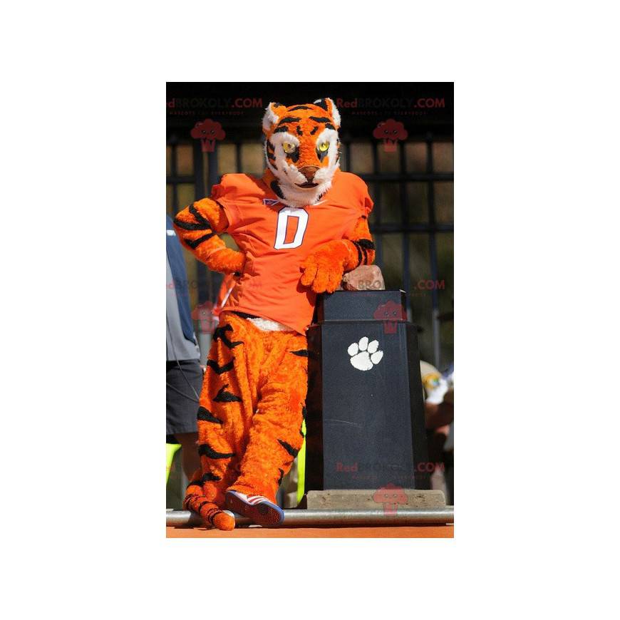 Orange white and black tiger mascot in sportswear -