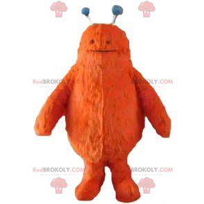 Süßes und haariges orange Monster Monster Maskottchen -