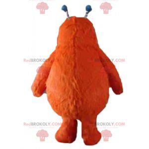 Süßes und haariges orange Monster Monster Maskottchen -