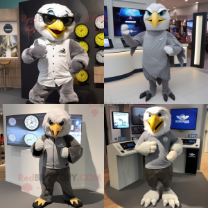 Gray Eagle mascot costume character dressed with a Henley Shirt and Digital watches