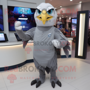 Gray Eagle mascot costume character dressed with a Henley Shirt and Digital watches