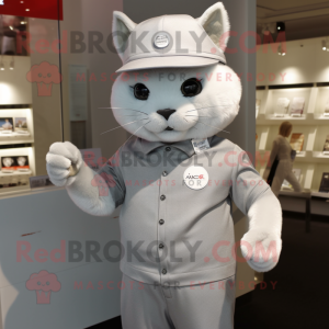 Silver Cat mascot costume character dressed with a Polo Shirt and Hat pins