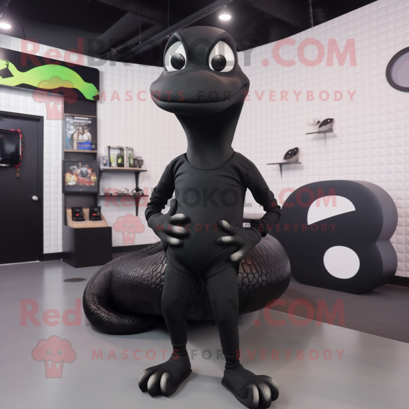 Black Titanoboa mascot costume character dressed with a Skinny Jeans and Shoe laces Black Titanoboa mascot costume character dressed with a Skinny Jeans and Shoe laces