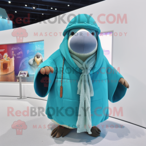 Cyan Walrus mascot costume character dressed with a Parka and Shawls