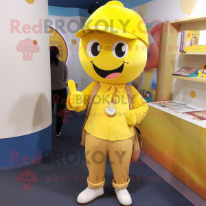 Yellow Plum mascot costume character dressed with a Oxford Shirt and Shoe laces