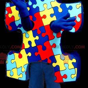 Mascotte pezzo di puzzle blu, giallo e rosso - Redbrokoly.com