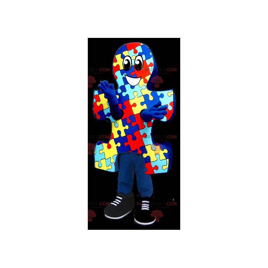 Blauw, geel en rood puzzelstukje mascotte - Redbrokoly.com