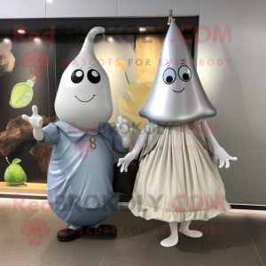 Silver Pear mascot costume character dressed with a Maxi Dress and Messenger bags