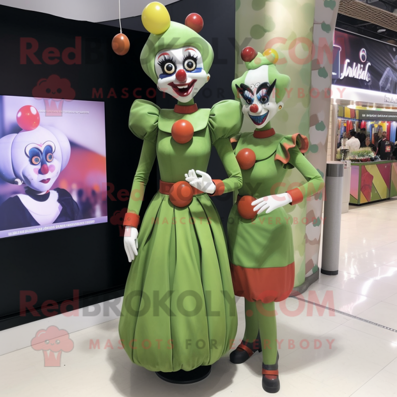 Olive Clown mascot costume character dressed with a Sheath Dress and Watches Olive Clown mascot costume character dressed with a Sheath Dress and Watches