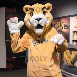 Gold Mountain Lion mascot costume character dressed with a Graphic Tee and Beanies