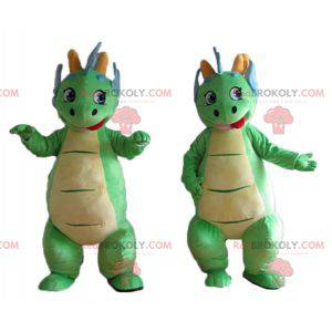 2 mascotes dinossauros verdes e azuis fofos e coloridos -